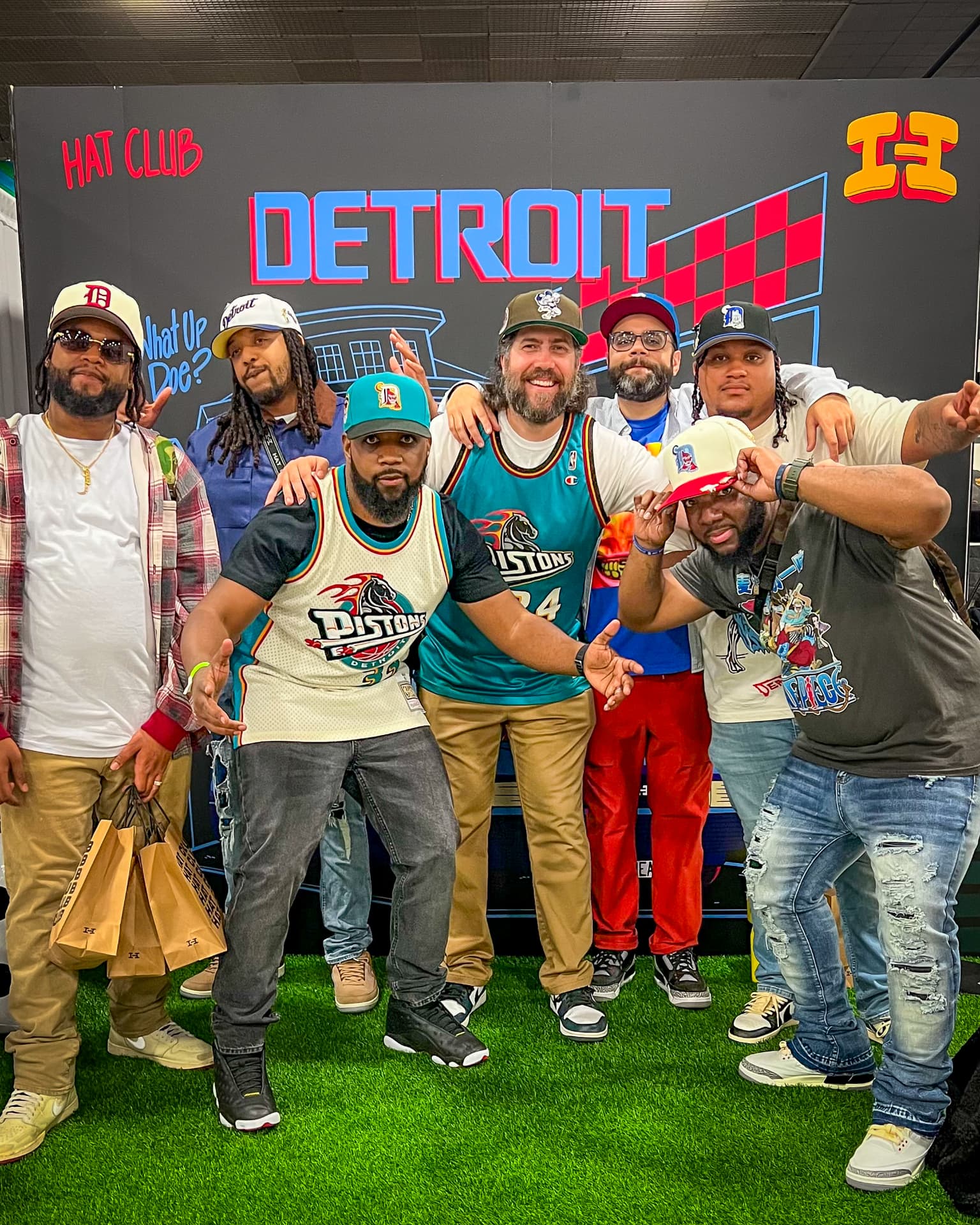 A group of cap collectors together at a Hat Club event in Detroit